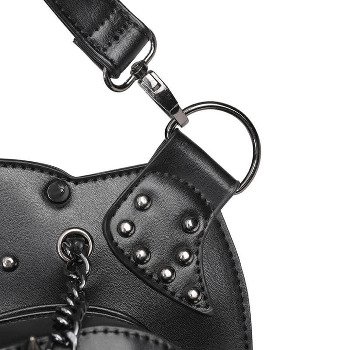 Sac à bandoulière convertible avec motif tête de mort