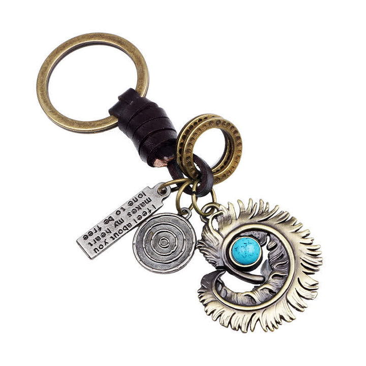 Porte-clés en cuir artificiel bleu turquoise avec queue de phénix