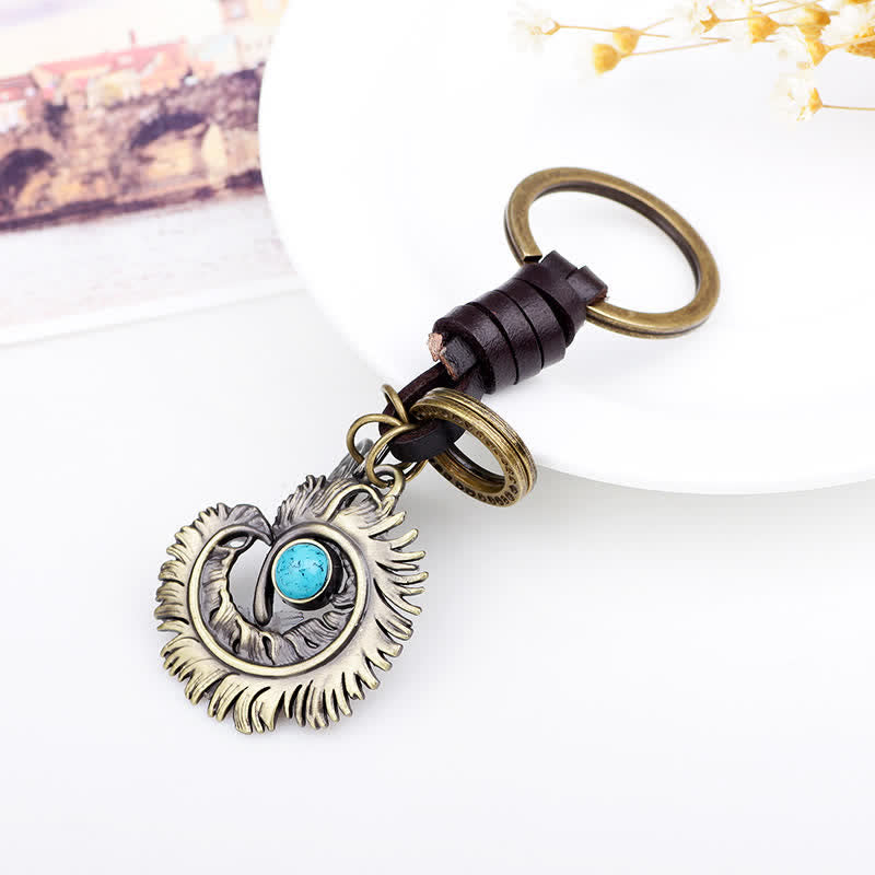 Porte-clés en cuir artificiel bleu turquoise avec queue de phénix