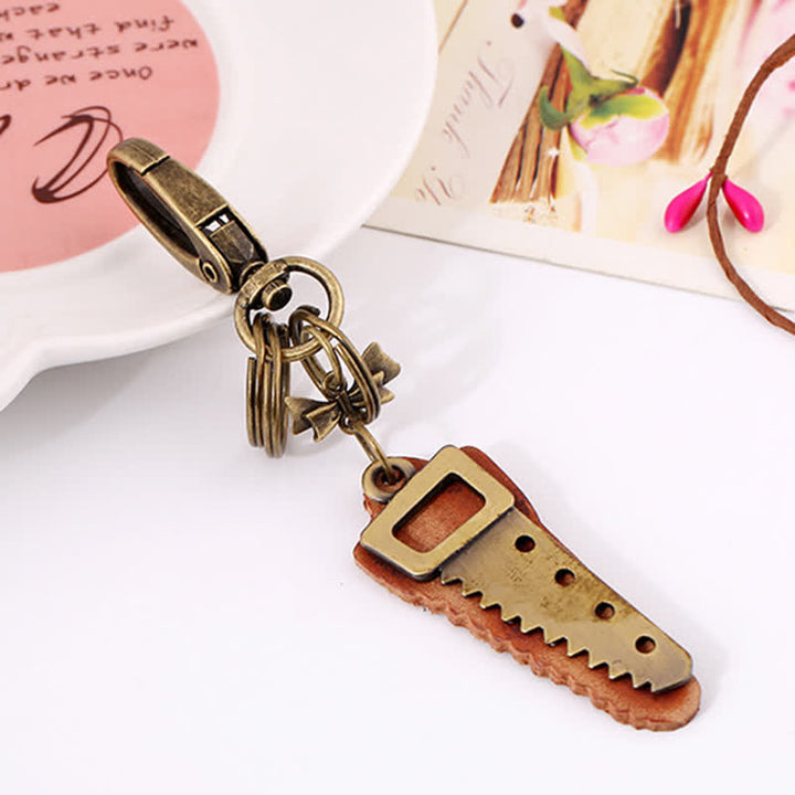 Porte-clés en cuir avec nœud papillon créatif en bronze