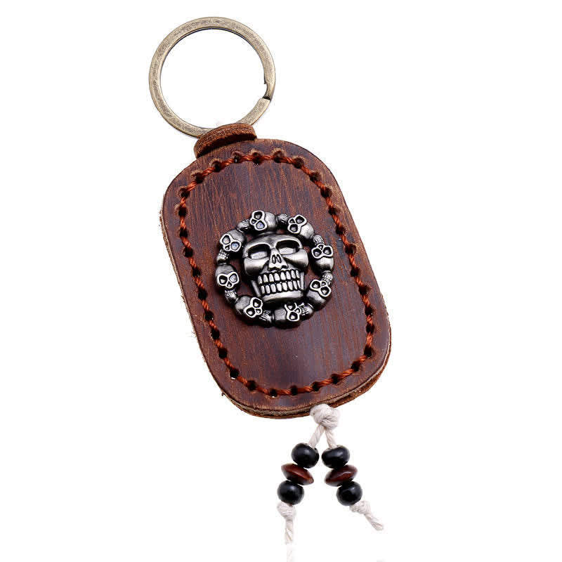 Porte-clés en cuir avec pendentif de style gothique en forme de crâne ovale