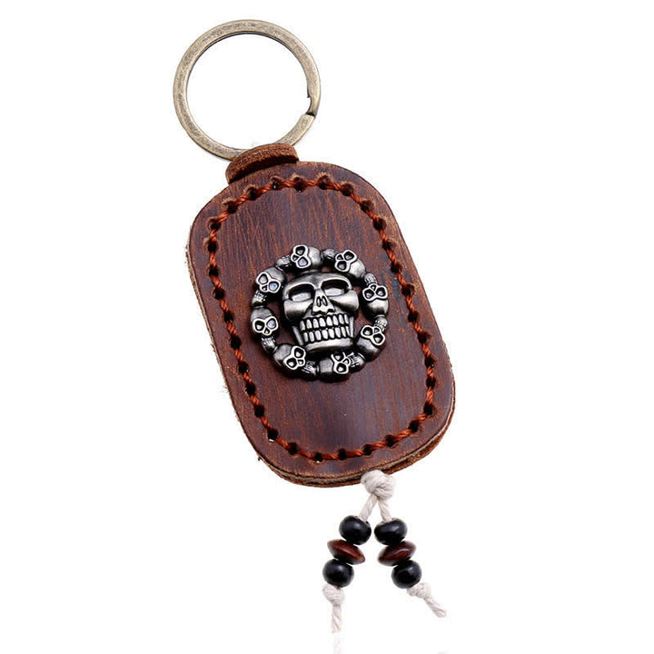 Porte-clés en cuir avec pendentif de style gothique en forme de crâne ovale