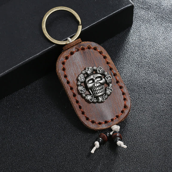 Porte-clés en cuir avec pendentif de style gothique en forme de crâne ovale