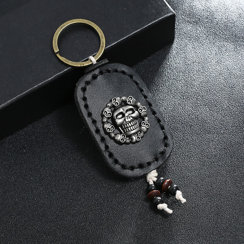 Porte-clés en cuir avec pendentif de style gothique en forme de crâne ovale