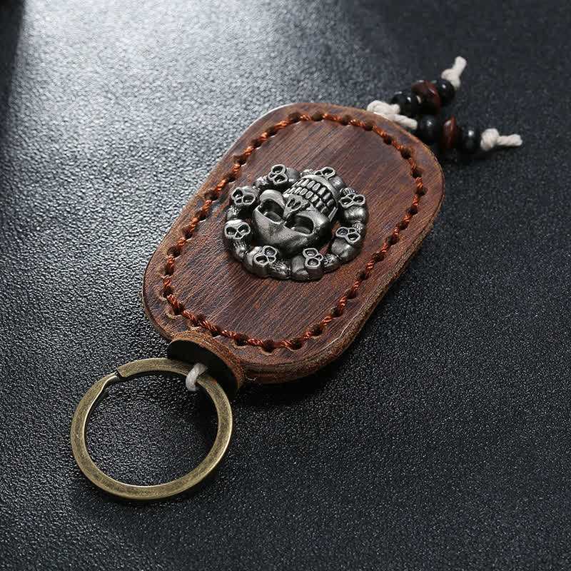 Porte-clés en cuir avec pendentif de style gothique en forme de crâne ovale