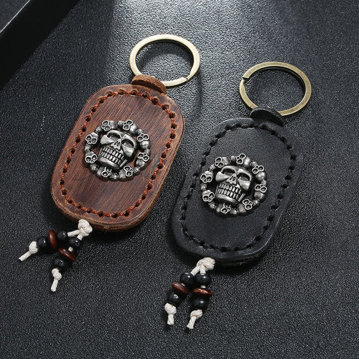 Porte-clés en cuir avec pendentif de style gothique en forme de crâne ovale