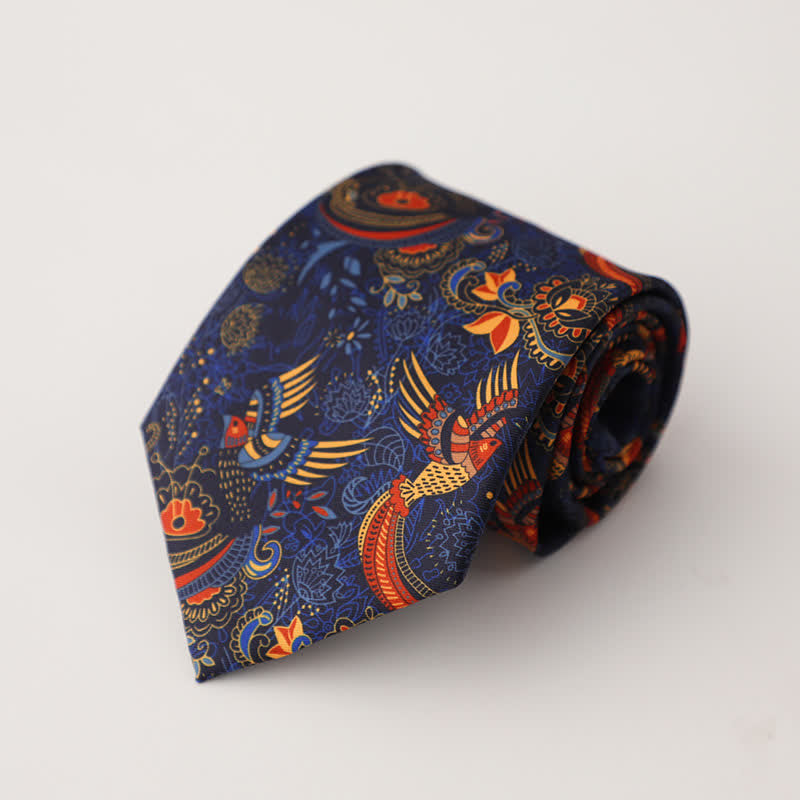 Cravate vibrante bleu marine et orange à motif oiseaux pour homme