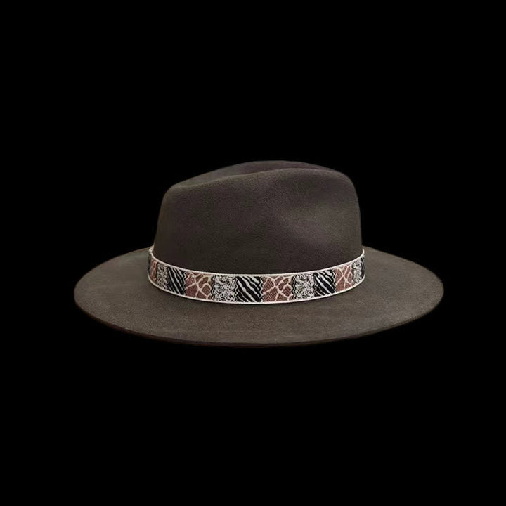 Bandeau à motif exotique vert foncé avec chapeau de cowboy en plumes