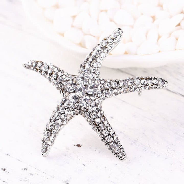 Broche en strass scintillante pour femme en forme d'étoile de mer