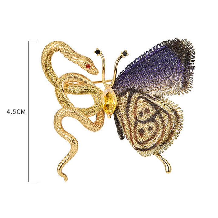 Broche pour femme avec broderie violette et serpent doré