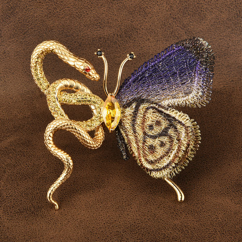 Broche pour femme avec broderie violette et serpent doré