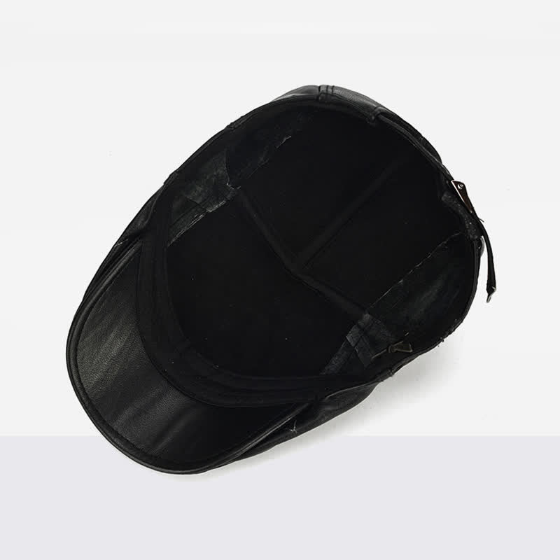 Béret en cuir de vachette à lacets latéraux