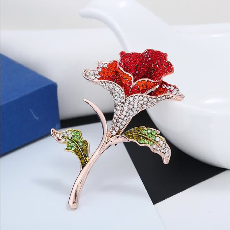Broche gracieuse et charmante en strass avec fleur d'orchidée