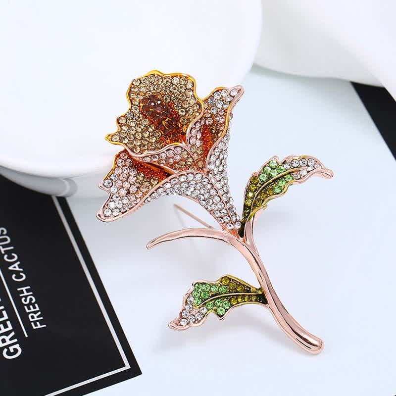 Broche gracieuse et charmante en strass avec fleur d'orchidée