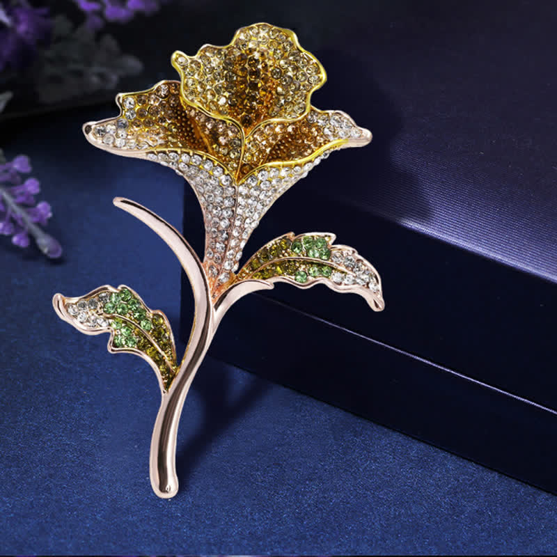 Broche gracieuse et charmante en strass avec fleur d'orchidée