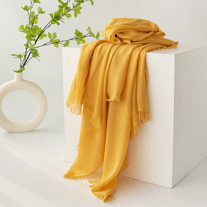 Écharpe d'été fine et douce à pompons courts de couleur unie