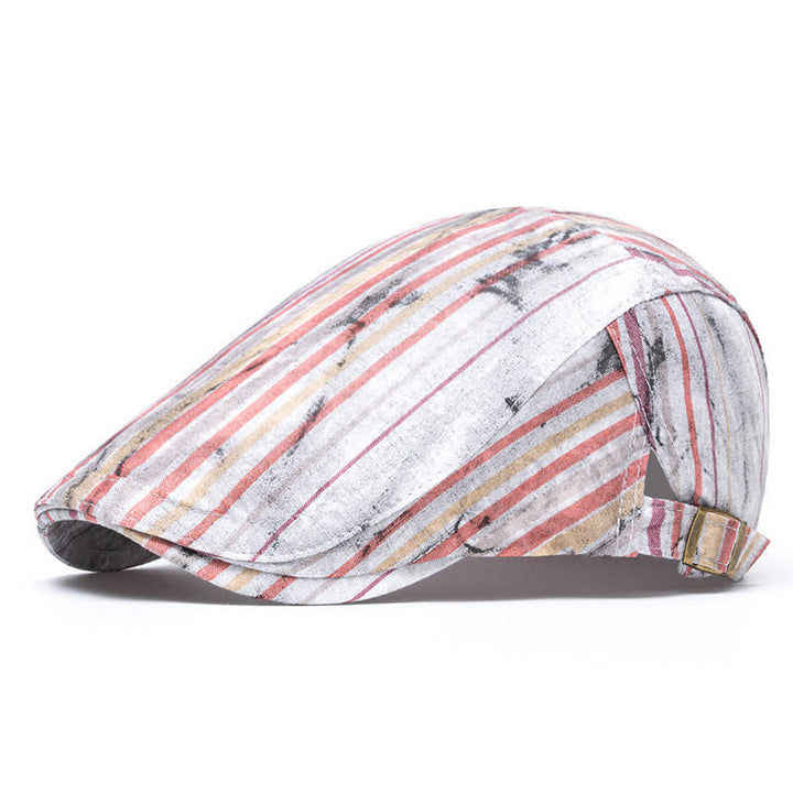 Béret gavroche rayé tie-dye graffiti pour fête de rue