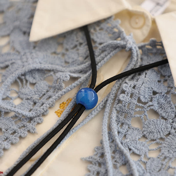 Cravate bolo faite à la main avec pendentif en agate bleue ronde simple