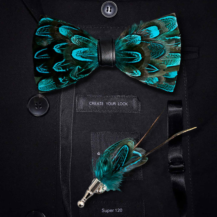 Nœud papillon en plumes de paon bleu sarcelle et noir avec épingle à revers