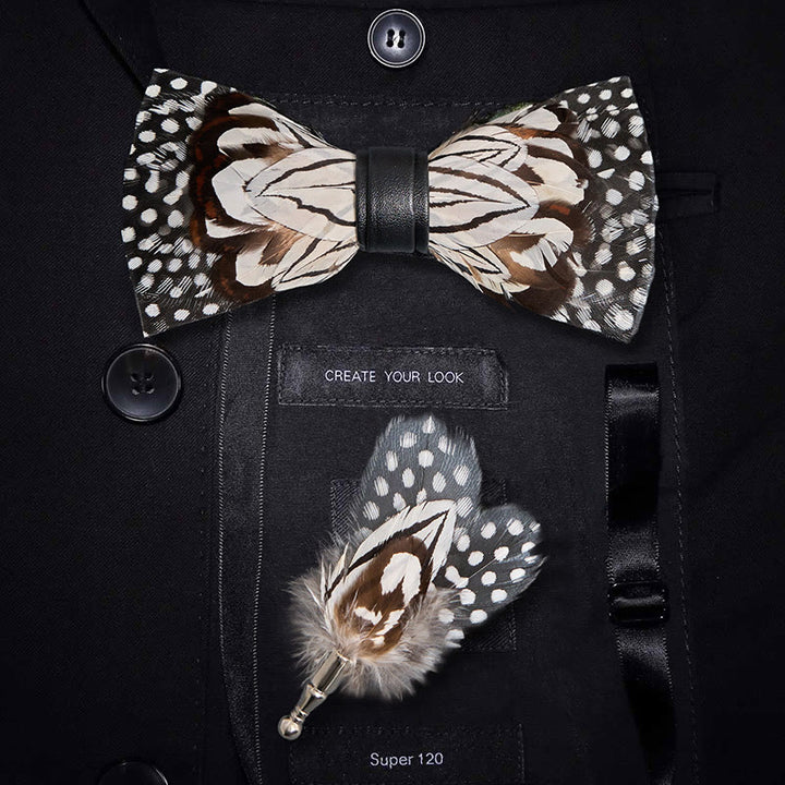 Nœud papillon en plumes de hibou noir et blanc avec épingle à revers
