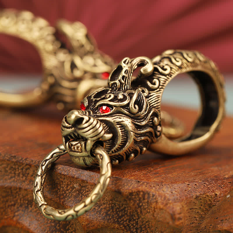 Porte-clés tête de loup aux yeux rouges en laiton massif - Laiton - image 0