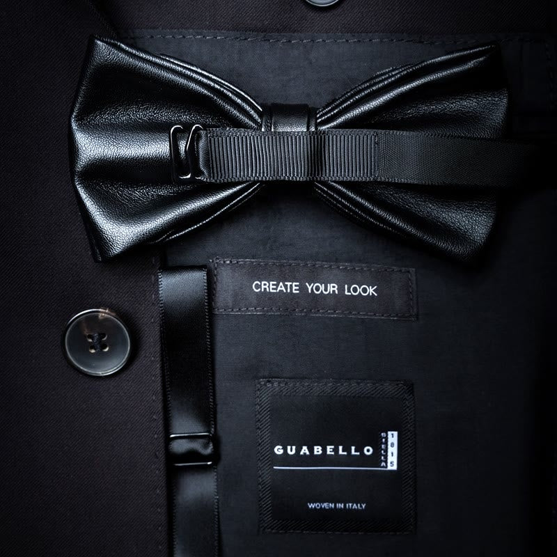 Nœud papillon en plumes de minuit noir et orange avec épingle à revers