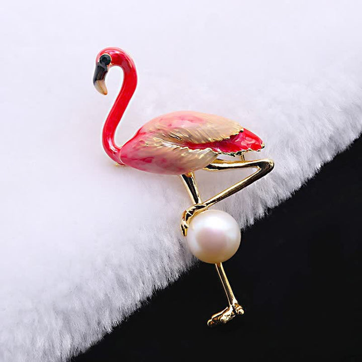 Broche flamant rose émaillée avec perle pour femme