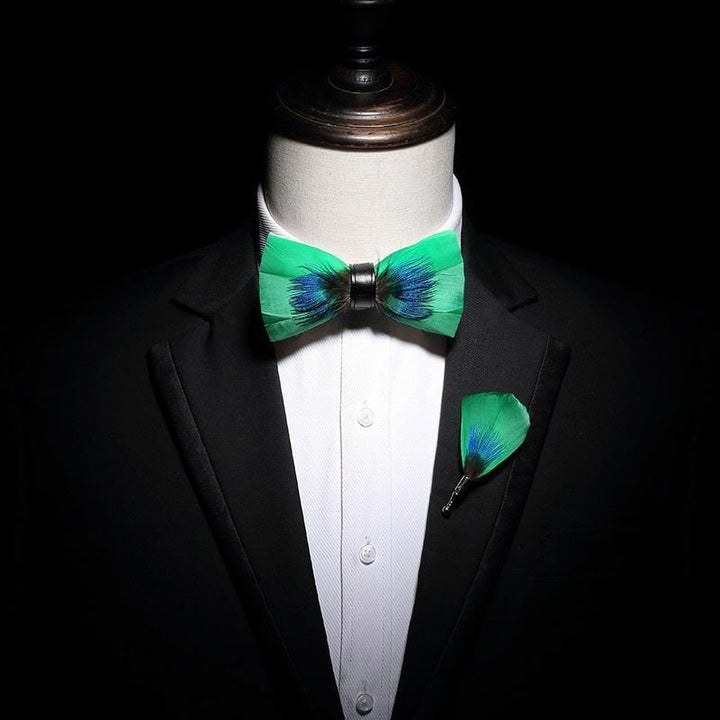 Nœud papillon fantaisie bleu et vert à plumes pour enfant avec épingle à revers