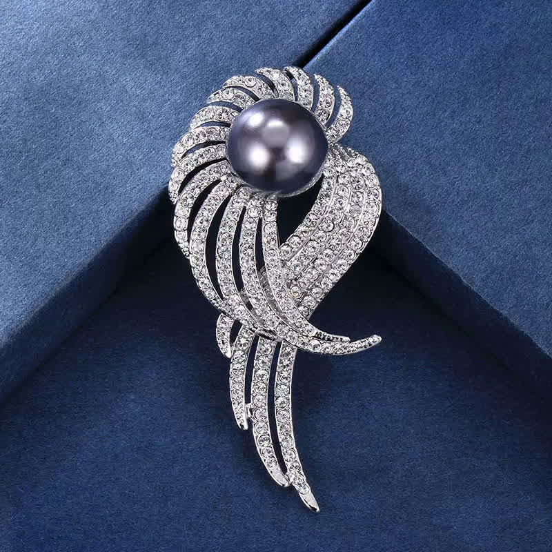 Broche en perles et plumes d'ailes d'ange pour femme