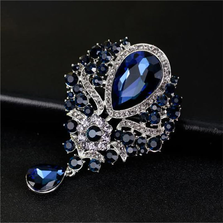 Broche en forme de goutte d'eau en verre transparent pour femme