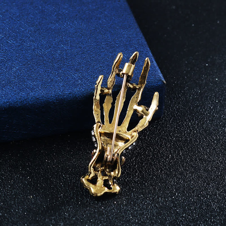 Broche en strass en forme de main de squelette pour homme