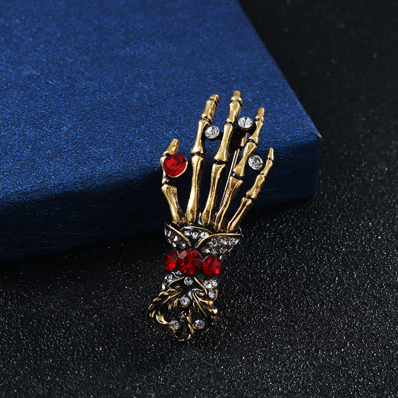 Broche en strass en forme de main de squelette pour homme