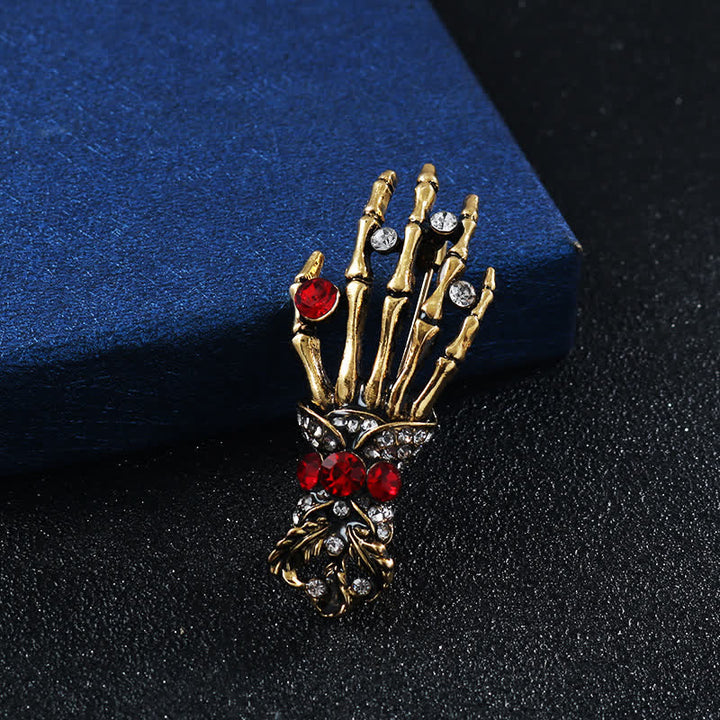 Broche en strass en forme de main de squelette pour homme