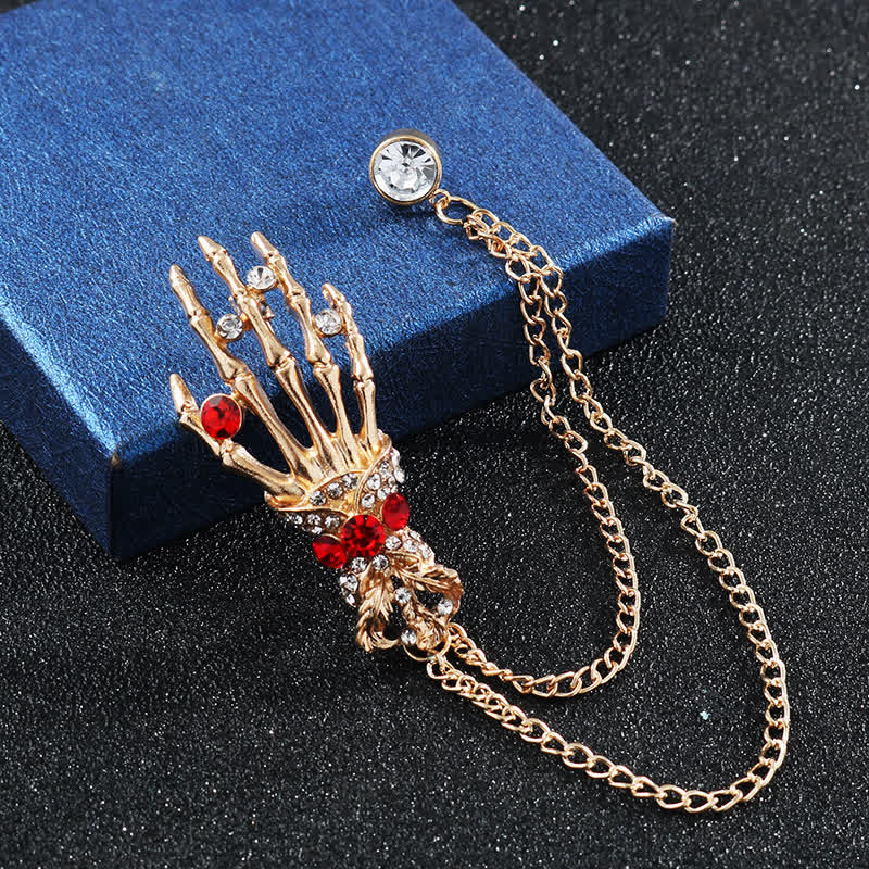 Broche en strass en forme de main de squelette pour homme