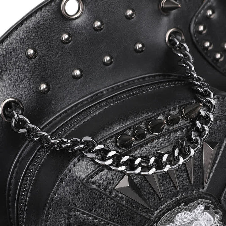 Sac à bandoulière convertible avec motif tête de mort