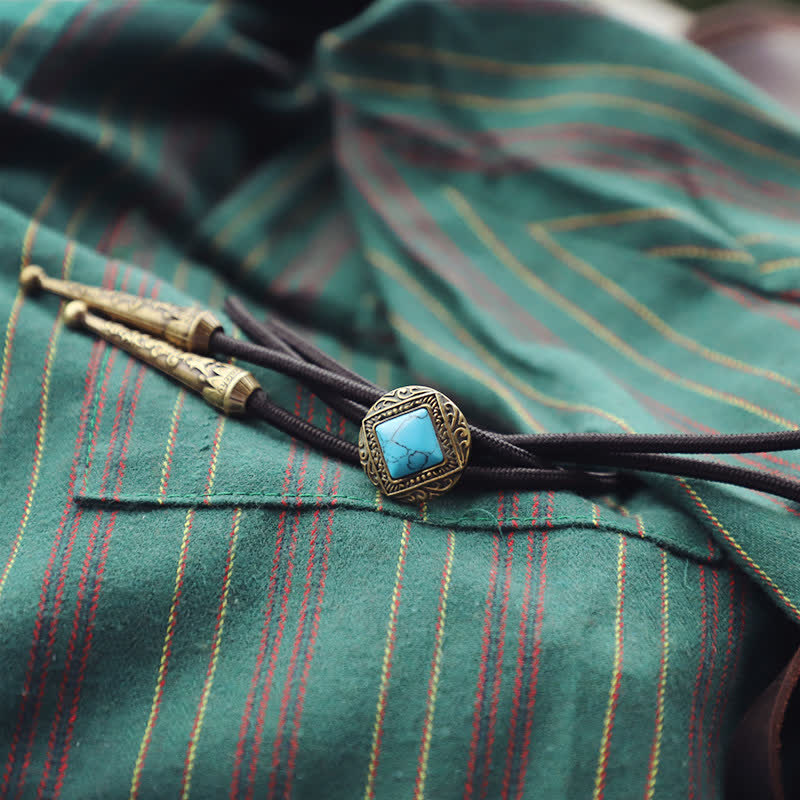 Cravate bolo en cuivre et fausse pierre turquoise