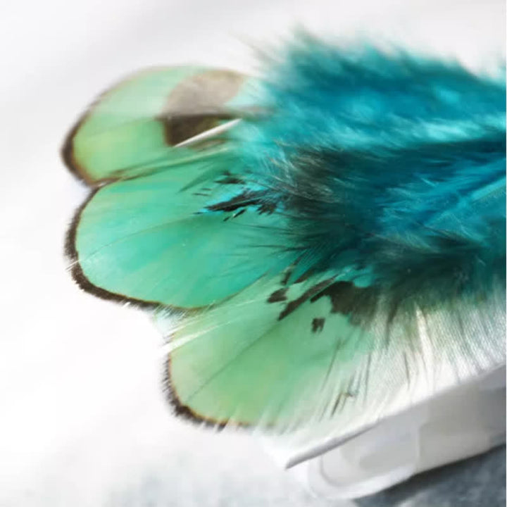 Nœud papillon en plumes de paon turquoise et blanc
