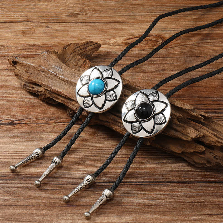 Cravate bolo en pierre turquoise noire à pétales ovales sculptés