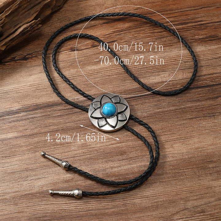 Cravate bolo en pierre turquoise noire à pétales ovales sculptés
