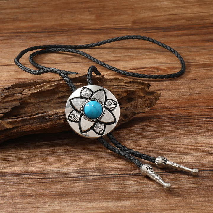 Cravate bolo en pierre turquoise noire à pétales ovales sculptés