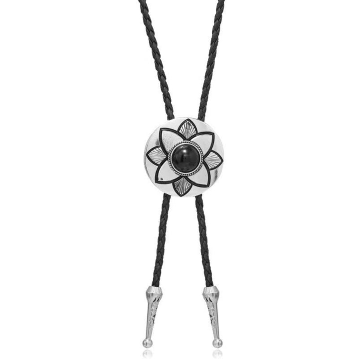 Cravate bolo en pierre turquoise noire à pétales ovales sculptés