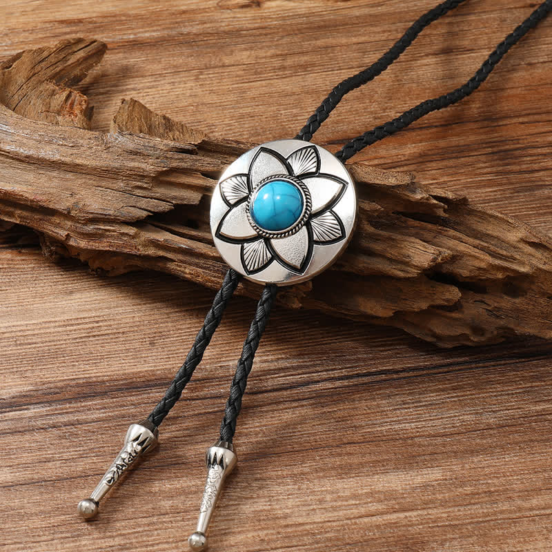 Cravate bolo en pierre turquoise noire à pétales ovales sculptés