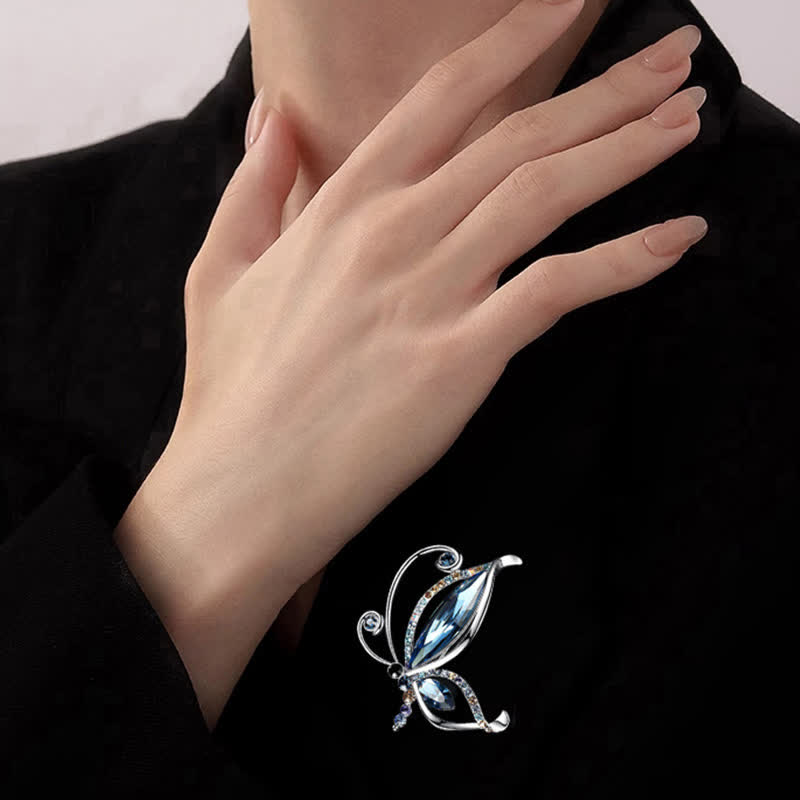 Broche papillon en cristal bleu strass pour femme
