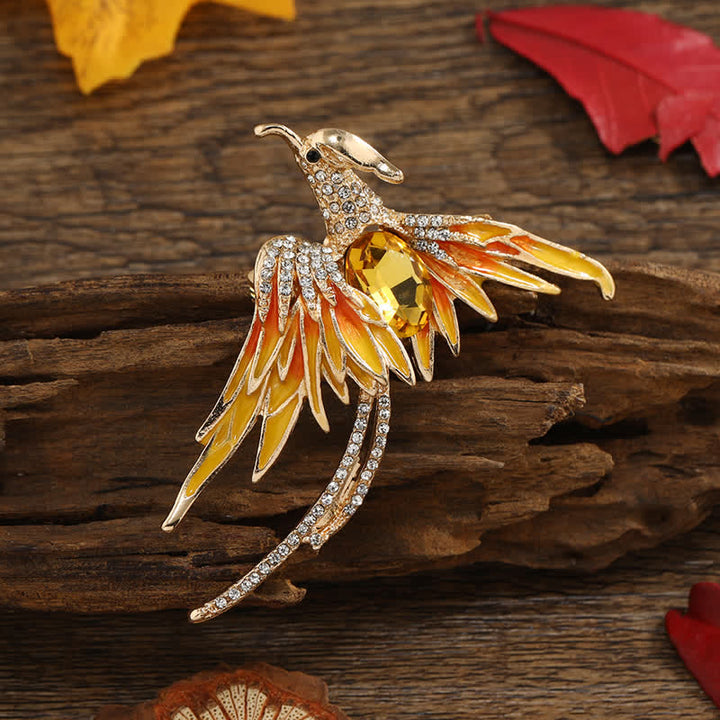 Broche en cristal et émail pour femme représentant un phénix volant