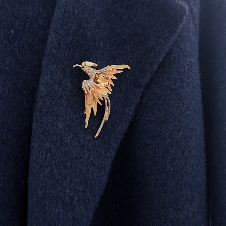 Broche en cristal et émail pour femme représentant un phénix volant