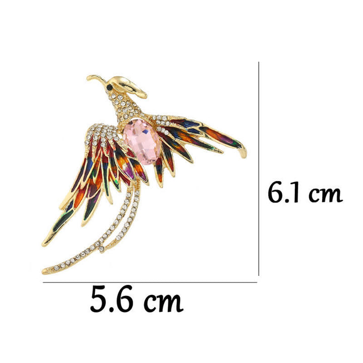 Broche en cristal et émail pour femme représentant un phénix volant