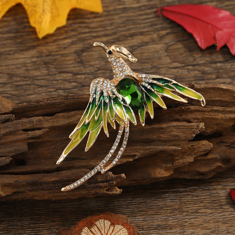 Broche en cristal et émail pour femme représentant un phénix volant