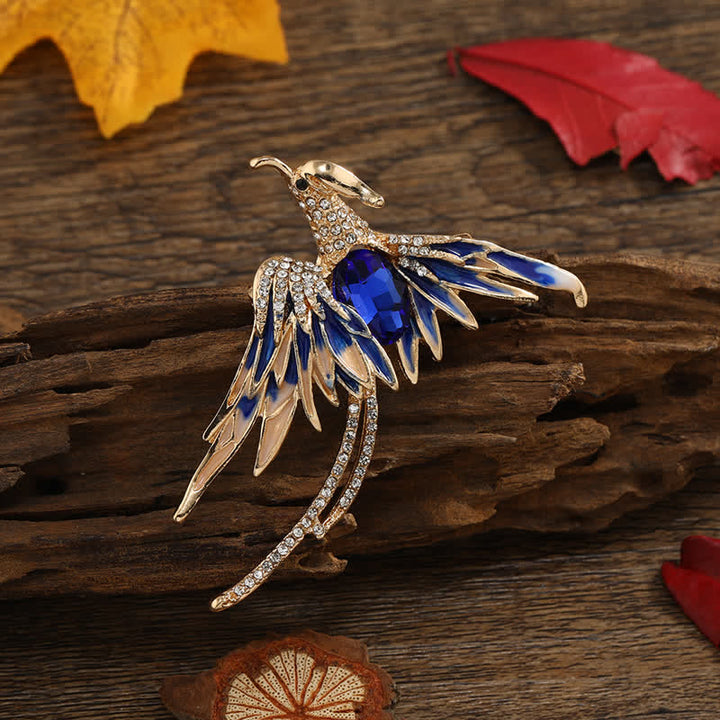 Broche en cristal et émail pour femme représentant un phénix volant