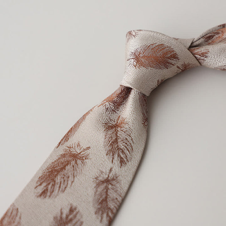 Cravate beige et marron à motif de plumes pour homme