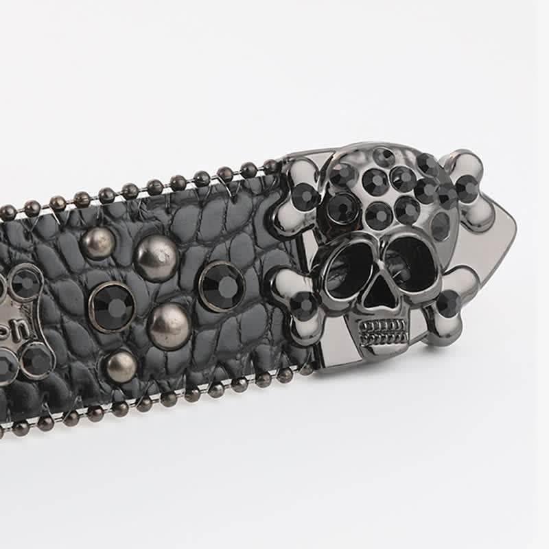 Ceinture en cuir avec mini tête de mort et rivets en strass